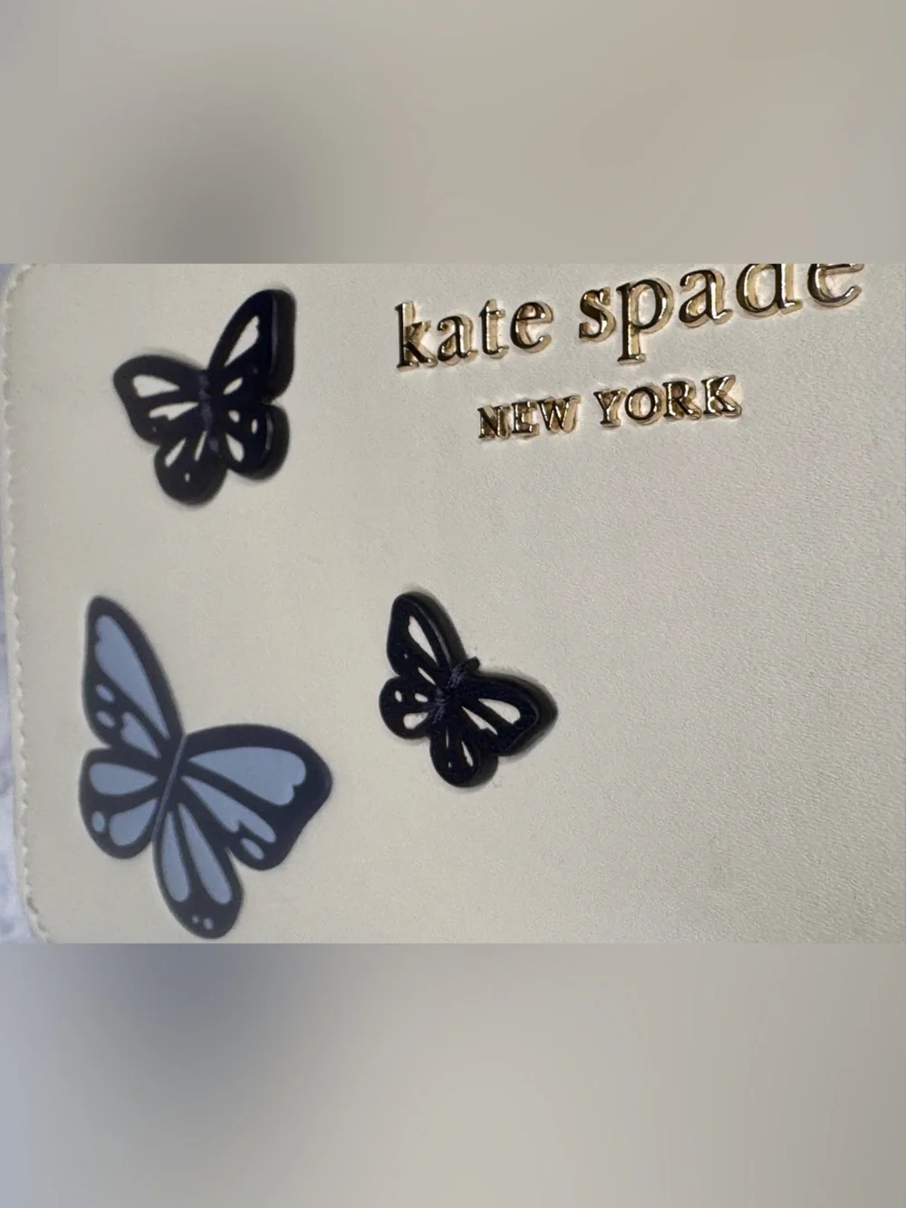 kate spade cream zip